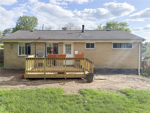 829 Cottonwood Dr, Monroeville, PA 15146 - back of house with brick siding, a deck, crawl space, and roof with shingles