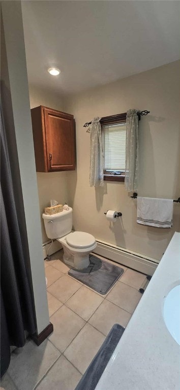 bathroom with baseboard heating, tile patterned floors, toilet, and recessed lighting