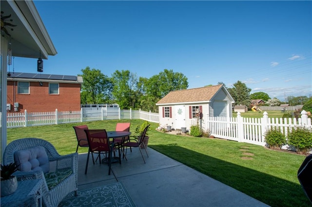 view of patio / terrace featuring an outdoor structure and outdoor dining space