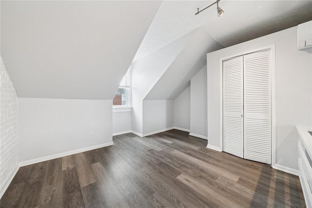 3474 Ligonier St, Lawrenceville, PA 15201 - bonus room featuring dark wood-style floors, baseboards, and vaulted ceiling