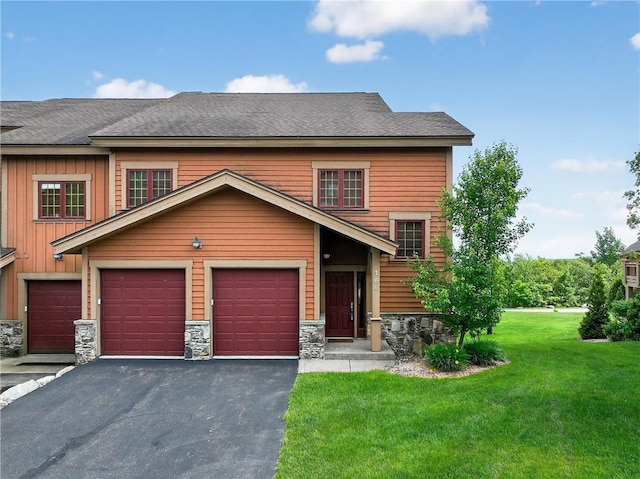 166 Southwind Dr, Seven Springs Resort, PA 15622 - view of front of property with a front yard, asphalt driveway, stone siding, and board and batten siding