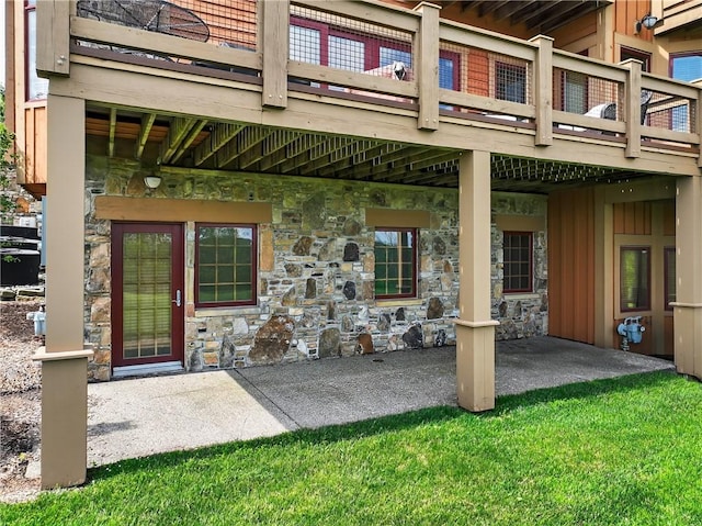 166 Southwind Dr, Seven Springs Resort, PA 15622 - entrance to property with stone siding, a patio, and board and batten siding