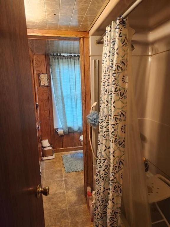 full bath with a shower with shower curtain