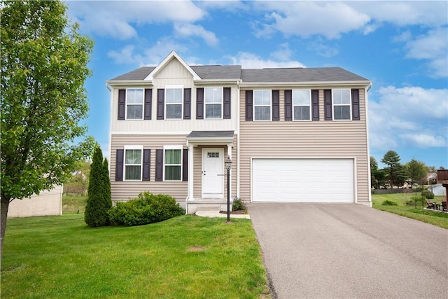 118 Leslie Farms Dr, Connoquenessing Boro, PA 16033 - view of front of property with a garage, driveway, and a front lawn