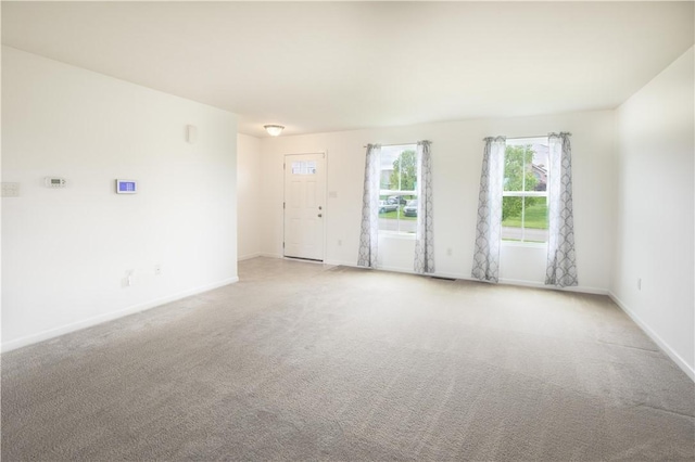 118 Leslie Farms Dr, Connoquenessing Boro, PA 16033 - unfurnished room featuring light colored carpet and baseboards