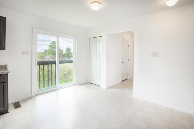 118 Leslie Farms Dr, Connoquenessing Boro, PA 16033 - empty room with plenty of natural light and baseboards