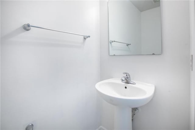 118 Leslie Farms Dr, Connoquenessing Boro, PA 16033 - bathroom featuring a sink