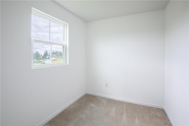 118 Leslie Farms Dr, Connoquenessing Boro, PA 16033 - empty room featuring light colored carpet and baseboards