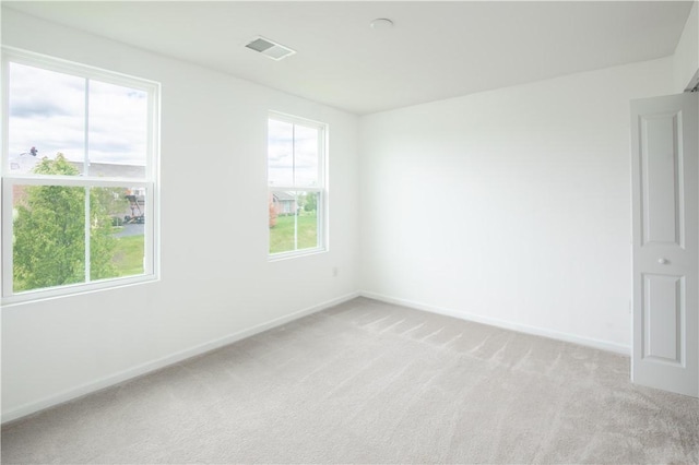 118 Leslie Farms Dr, Connoquenessing Boro, PA 16033 - spare room with light colored carpet and baseboards