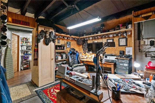 misc room with wood walls