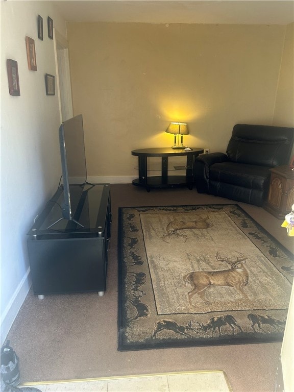 living room featuring baseboards
