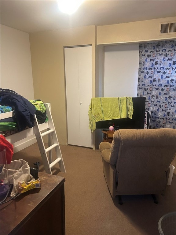 living area featuring carpet flooring