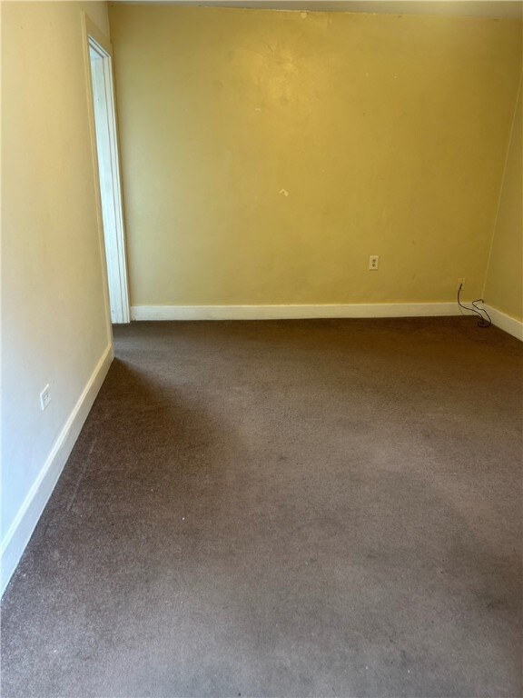 704/706 Holland St, Vandergrift Wml, PA 15690 - spare room featuring carpet and baseboards
