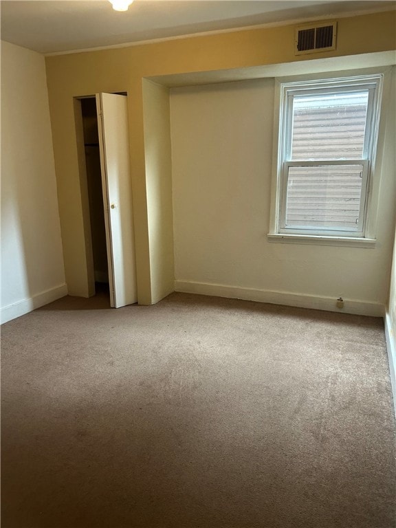 704/706 Holland St, Vandergrift Wml, PA 15690 - unfurnished bedroom with light colored carpet, baseboards, and a closet