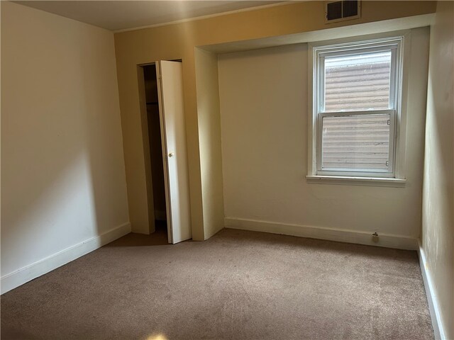 704/706 Holland St, Vandergrift Wml, PA 15690 - carpeted empty room with baseboards