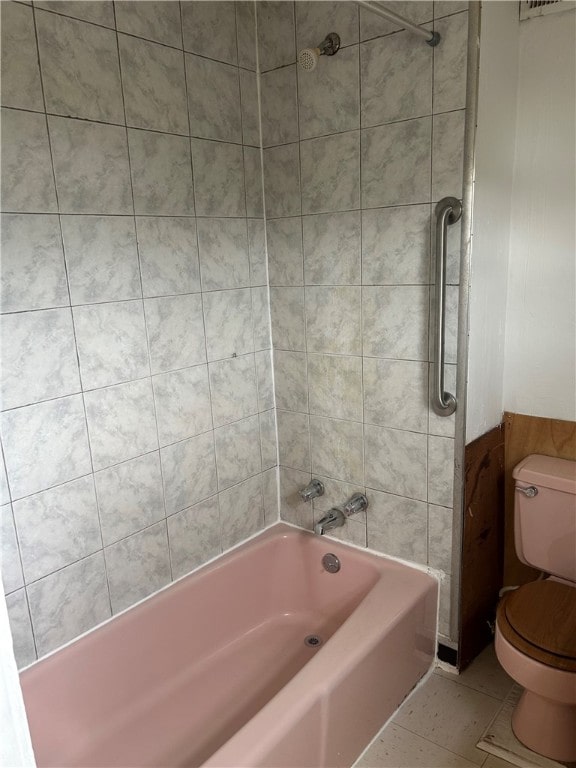 704/706 Holland St, Vandergrift Wml, PA 15690 - full bath featuring toilet, shower / bath combination, and tile patterned flooring