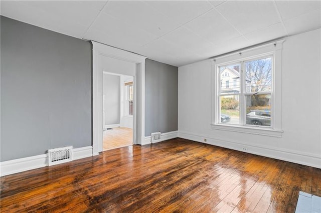 3014 Versailles Ave, Mckeesport, PA 15132 - unfurnished room featuring hardwood / wood-style floors and baseboards