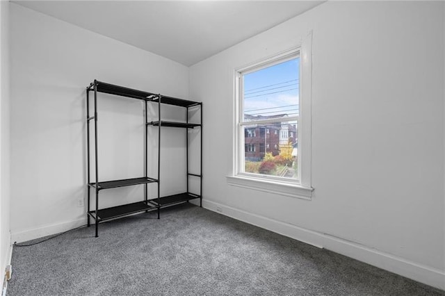3014 Versailles Ave, Mckeesport, PA 15132 - unfurnished bedroom with carpet floors, multiple windows, and baseboards