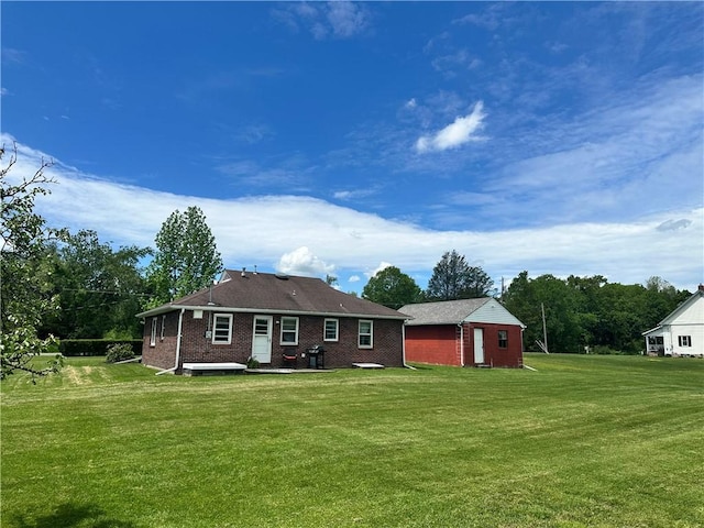 2205 Dellenbaugh Rd, Frazer, PA 15084 - rear view of house with a lawn and brick siding