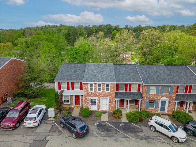 1408 Timberidge Dr, Bethel Park, PA 15102 - view of front of house featuring uncovered parking and brick siding