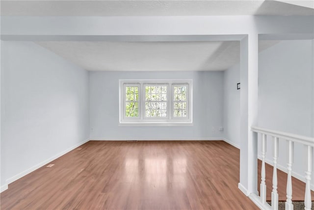 1408 Timberidge Dr, Bethel Park, PA 15102 - spare room with wood finished floors and baseboards