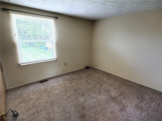 620 Gross St, Conway, PA 15027 - carpeted spare room with a textured ceiling