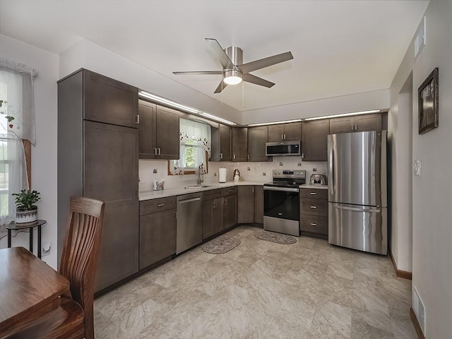 349 Marwood Rd, Winfield Twp, PA 16023 - kitchen featuring appliances with stainless steel finishes, a ceiling fan, dark brown cabinets, light countertops, and a sink