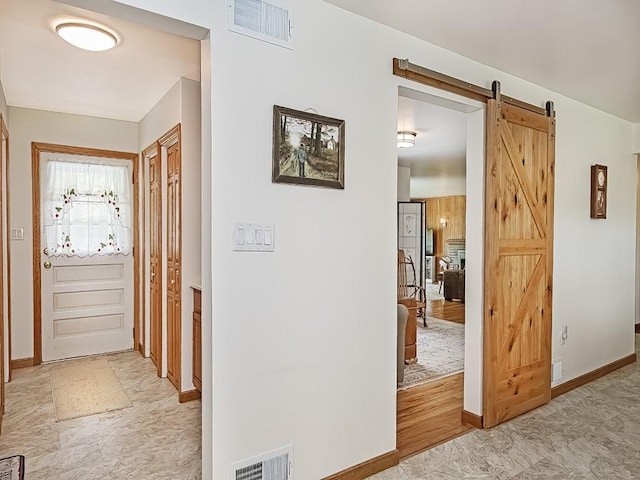 349 Marwood Rd, Winfield Twp, PA 16023 - corridor with a barn door and baseboards