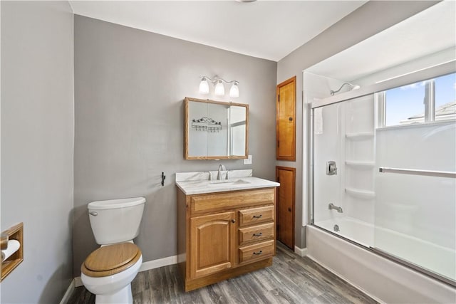 716 Center Ave N, Charleroi, PA 15022 - full bathroom with wood finished floors, baseboards, and toilet