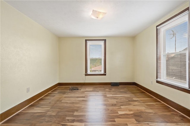 716 Center Ave N, Charleroi, PA 15022 - spare room with wood finished floors and baseboards
