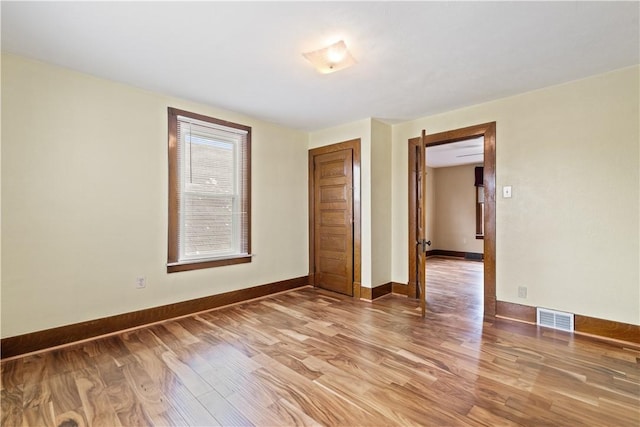 716 Center Ave N, Charleroi, PA 15022 - empty room with light wood-style floors and baseboards