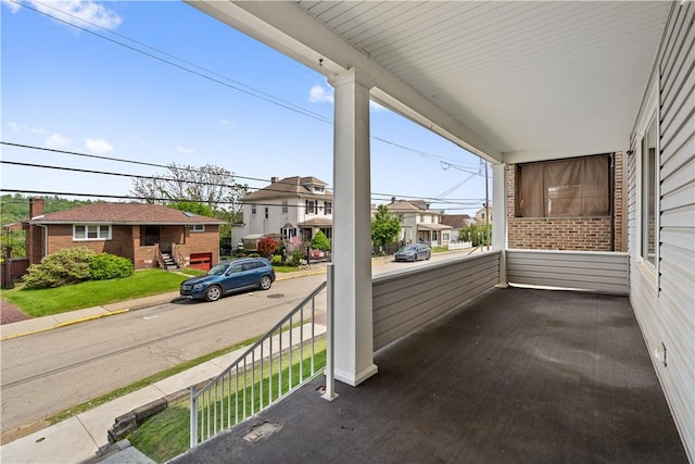 716 Center Ave N, Charleroi, PA 15022 - balcony with a residential view and covered porch