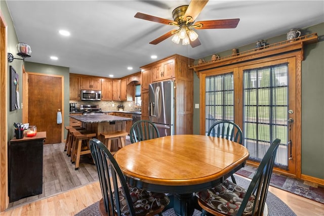 dining space featuring ceiling fan, recessed lighting, and light wood-type flooring