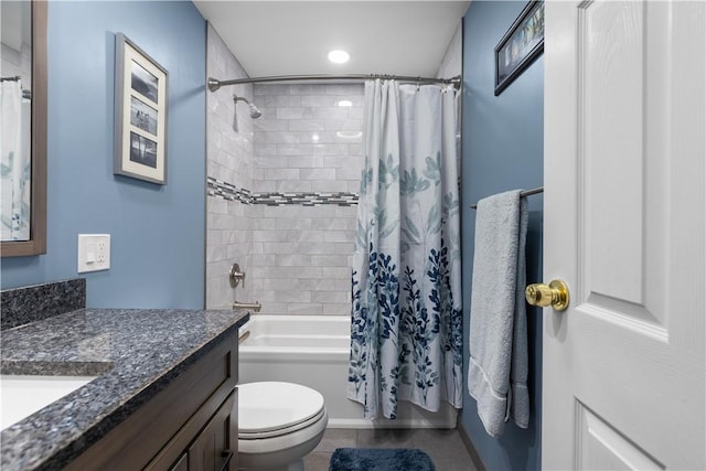 bathroom featuring vanity, shower / tub combo, recessed lighting, toilet, and tile patterned floors