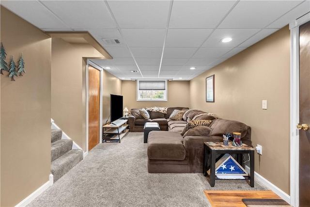 living room featuring carpet flooring, a paneled ceiling, recessed lighting, and baseboards
