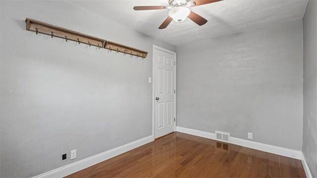 172 Orchard Dr, Pleasant Hills, PA 15236 - spare room with baseboards, wood finished floors, and a ceiling fan