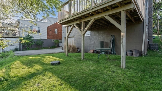 172 Orchard Dr, Pleasant Hills, PA 15236 - view of grassy yard featuring a garage, a deck, and driveway