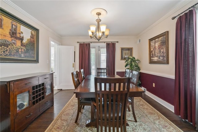 363 Highland Ave, West View, PA 15229 - dining room featuring a chandelier, dark wood-style flooring, crown molding, and baseboards
