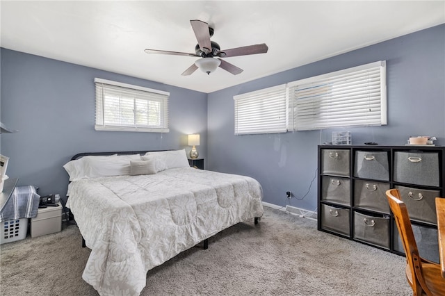 bedroom with carpet flooring, ceiling fan, and baseboards