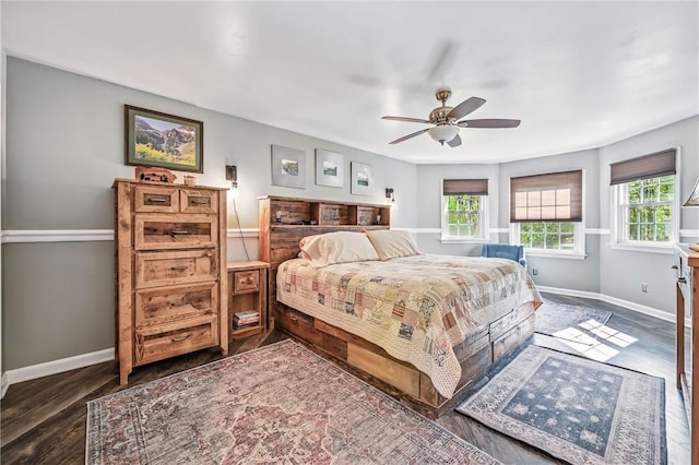 9935 Greiser Rd, Conneaut Lake Cra, PA 16316 - bedroom featuring multiple windows, baseboards, dark wood finished floors, and ceiling fan
