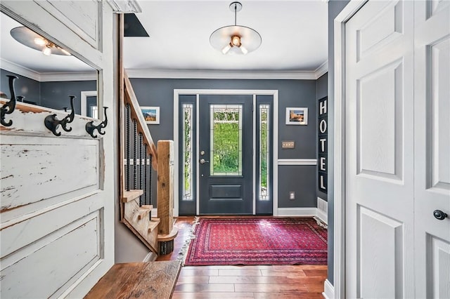 9935 Greiser Rd, Conneaut Lake Cra, PA 16316 - entryway featuring stairs, hardwood / wood-style floors, ornamental molding, and baseboards