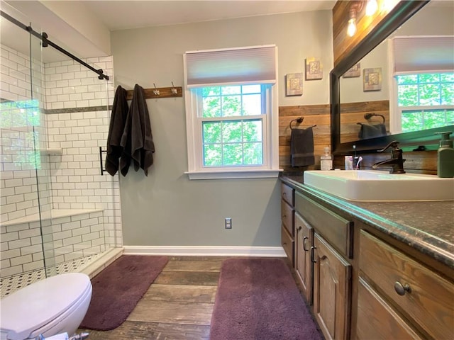 9935 Greiser Rd, Conneaut Lake Cra, PA 16316 - full bath featuring wood finished floors, plenty of natural light, a stall shower, and vanity