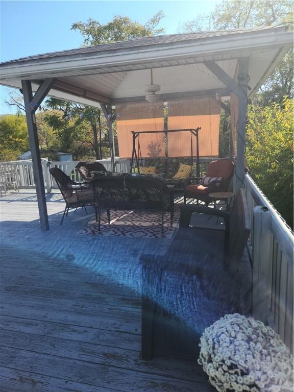 807 W 1st Ave, Derry Twp, PA 15627 - wooden deck with a gazebo, ceiling fan, and an outdoor living space