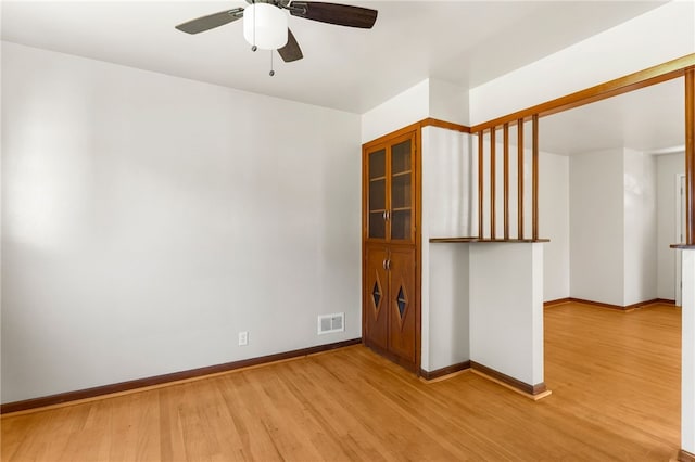 800 Smith Ave, Sharon, PA 16146 - spare room featuring light wood finished floors, a ceiling fan, and baseboards