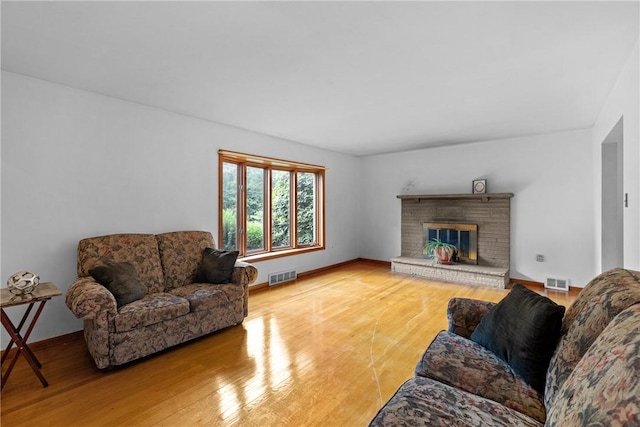 2221 Neish Ave, Hopewell Twp Bea, PA 15001 - living area with wood finished floors and a fireplace