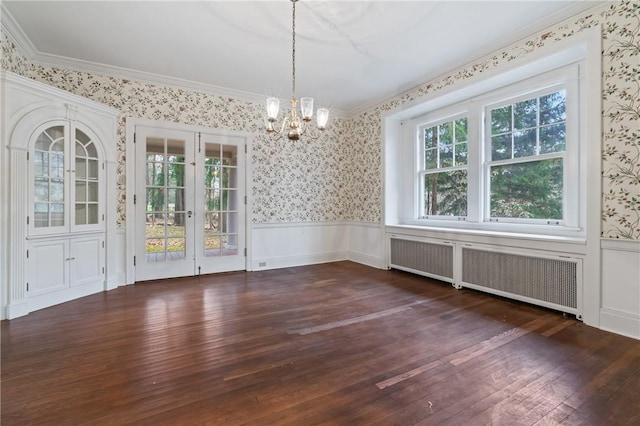 126 Oakford Park Rd, Hempfield Twp Wml, PA 15644 - unfurnished dining area with radiator, wallpapered walls, a chandelier, hardwood / wood-style flooring, and wainscoting