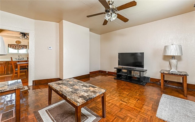 5 Carrie St, Rear, Fineview, PA 15212 - living area with ceiling fan and baseboards