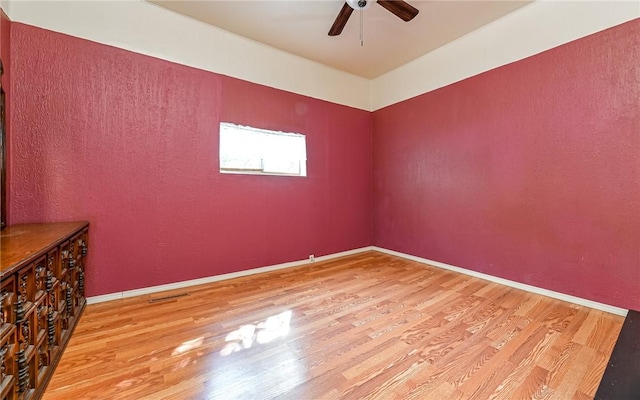 5 Carrie St, Rear, Fineview, PA 15212 - empty room with wood finished floors, ceiling fan, and baseboards