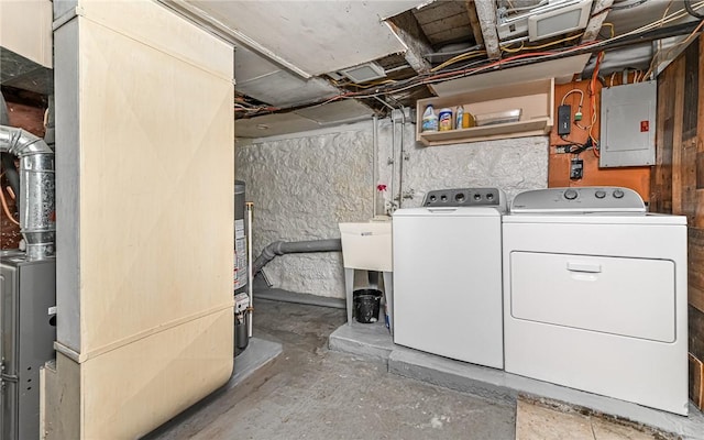5 Carrie St, Rear, Fineview, PA 15212 - laundry area featuring electric panel, washer and dryer, and heating unit