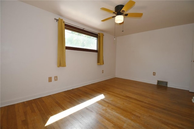 200 Graham St, Sewickley, PA 15143 - empty room featuring a ceiling fan, wood-type flooring, and baseboards